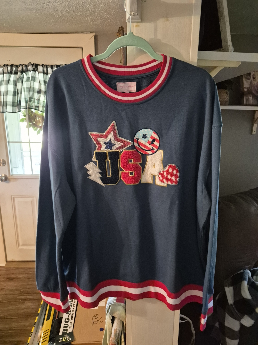 the Simply Southern USA Navy Varsity Crew Sweatshirt featuring colorful patrioti